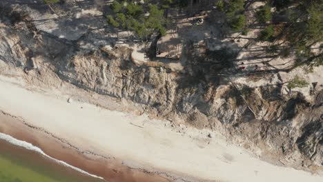 aerial: the dutchman's cap sandy beach and viewpoint on parabolic dune