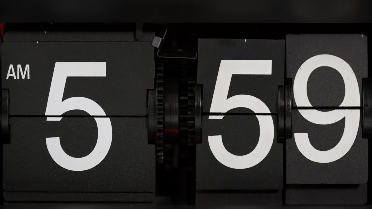 flip clock on black background Showtime am05.59.