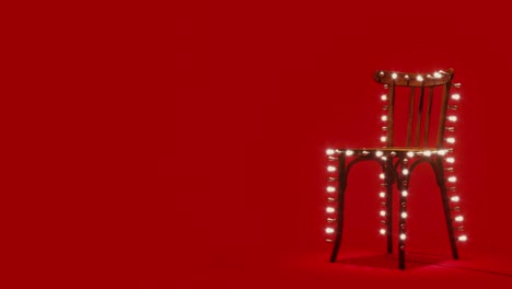 loop motion of electric light bulbs and wood chair on red background. 4k uhd 3d render animation.