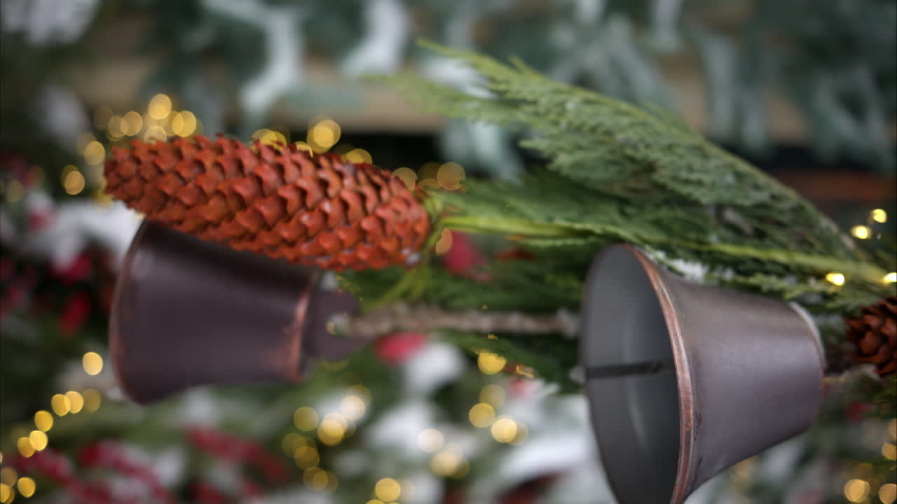 Christmas fir tree with decoratons bells outside and white snow
