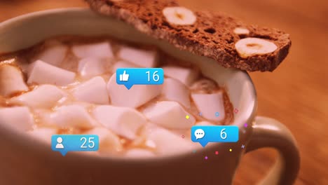 animation of media icons and cocoa with marshmallows at christmas