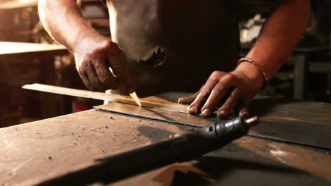 mid-section of welder working