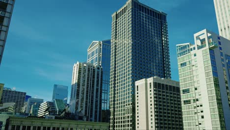 Angled-up-shot-of-Chicago-Downtown-with-smoking-horns