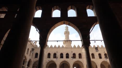 minaret seen from courtyard of sultan al-nasir muhammad ibn qalawun mosque, salah al-din al-ayyubi citadel at cairo in egypt. low angle