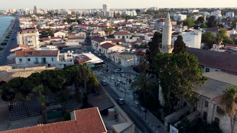 Djami-Kebir-Mosque-and-Tower-in-Larnaca-Oldtown-City-in-Cyprus,-Orbit-Aerial