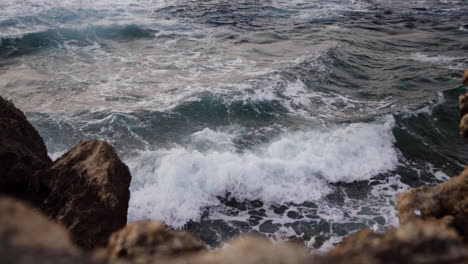 slowmo gimbal shot of ocean waves, malta