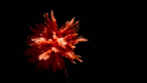 orange colored powder thrown in black background