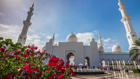 abu dhabi sunny day bright flowers grand mosque front entrance panorama 4k timelapse uae