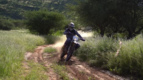dirt bikers racing around a corner