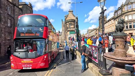 tour bus navigating busy edinburgh street