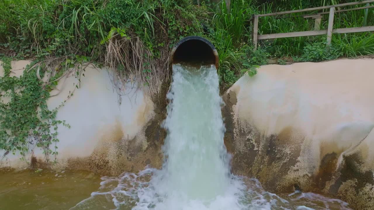 Water Coming From Pipe, Barrick Gold Mine, Dominican Republic - Drone Shot