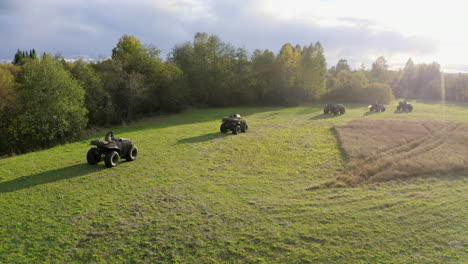 group of atvs in a field