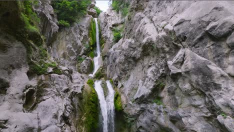 establish ponds and waterfalls of river cetina, croatia, drone forward rising