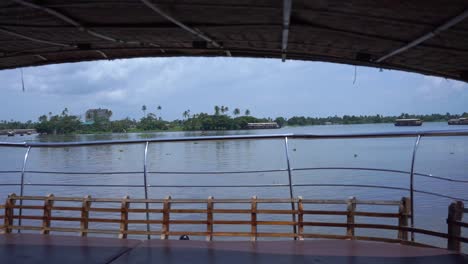 inside and outside view of the houseboat, a long seat inside a houseboat