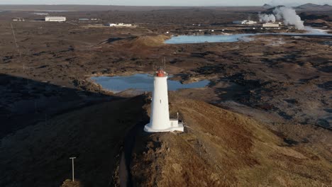 aerial of famous reykjanesviti lighthouse in volcanic landscape of iceland