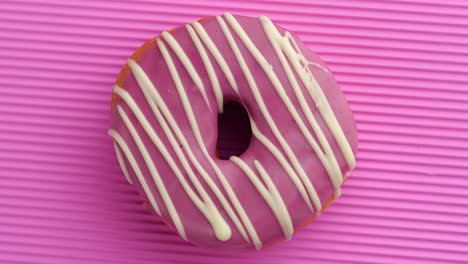 el donut está vidriado de cerca, con un bucle sin costuras.