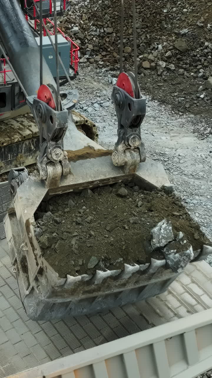 Excavator Dumping Material at a Mining or Construction Site