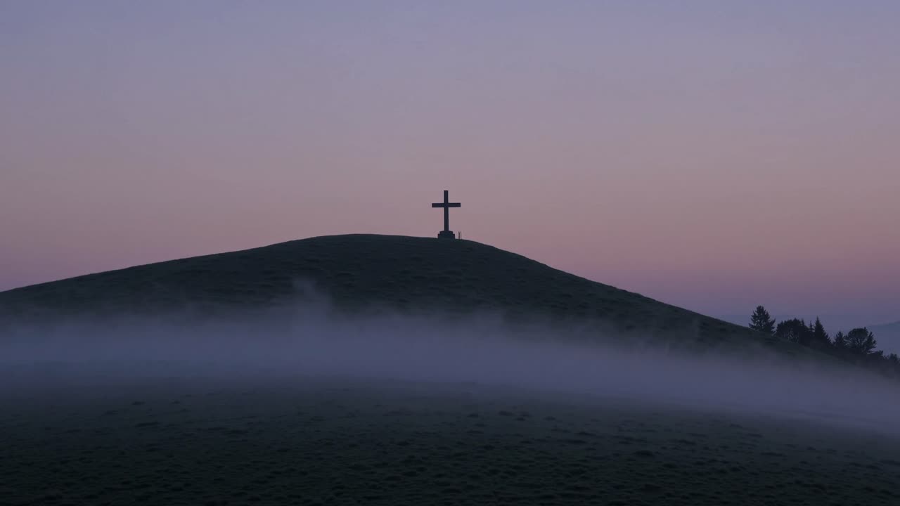 CGI of a lone cross on a misty hill at sunrise—perfect for symbolizing faith, solitude, and spiritual reflection in serene natural settings.