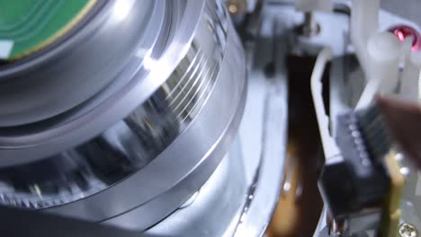Vhs video helical head starting to work when inserting a video cassette