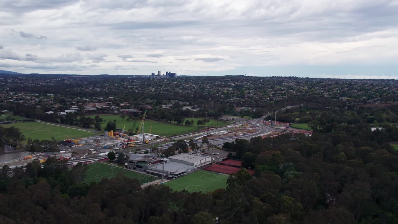 Drone view looking towards the Bulleen Road interchange with the Eastern Freeway during construction of the North East Link project in December 2023, Victoria, Australia.