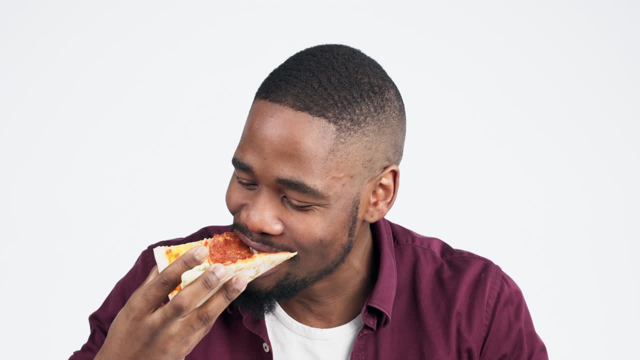 Hungry, face and a black man with pizza on a white