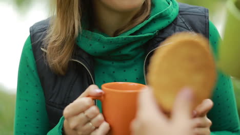 couple on vacation drinking tea. young couple enjoying weather drinking tea in nature