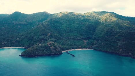 Mountain-Range-next-to-the-Ocean-in-the-Comoros---Aerial-drone-shot