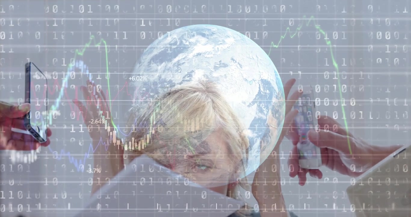 Female manager sitting at desk reacting to emerging devices, globe and financial data overloading