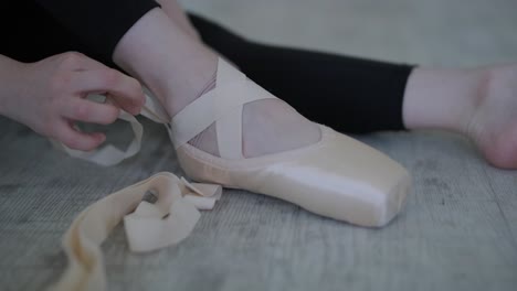 young ballet girl at studio lesson. training performance. stretching exercise pose. ballerina practice balance technique. classical elegance fitness.