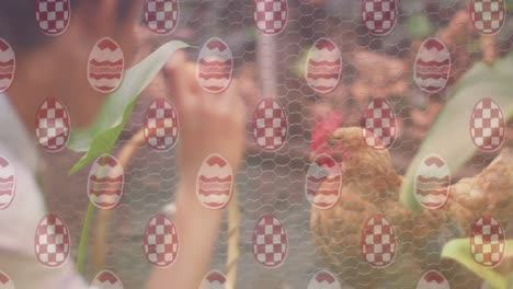 Animation-of-egg-pattern-over-asian-boy-and-chicken