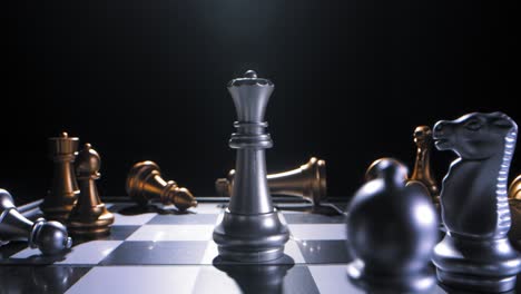 Game-of-chess-where-silver-queen-topples-over-the-gold-king-to-take-victory