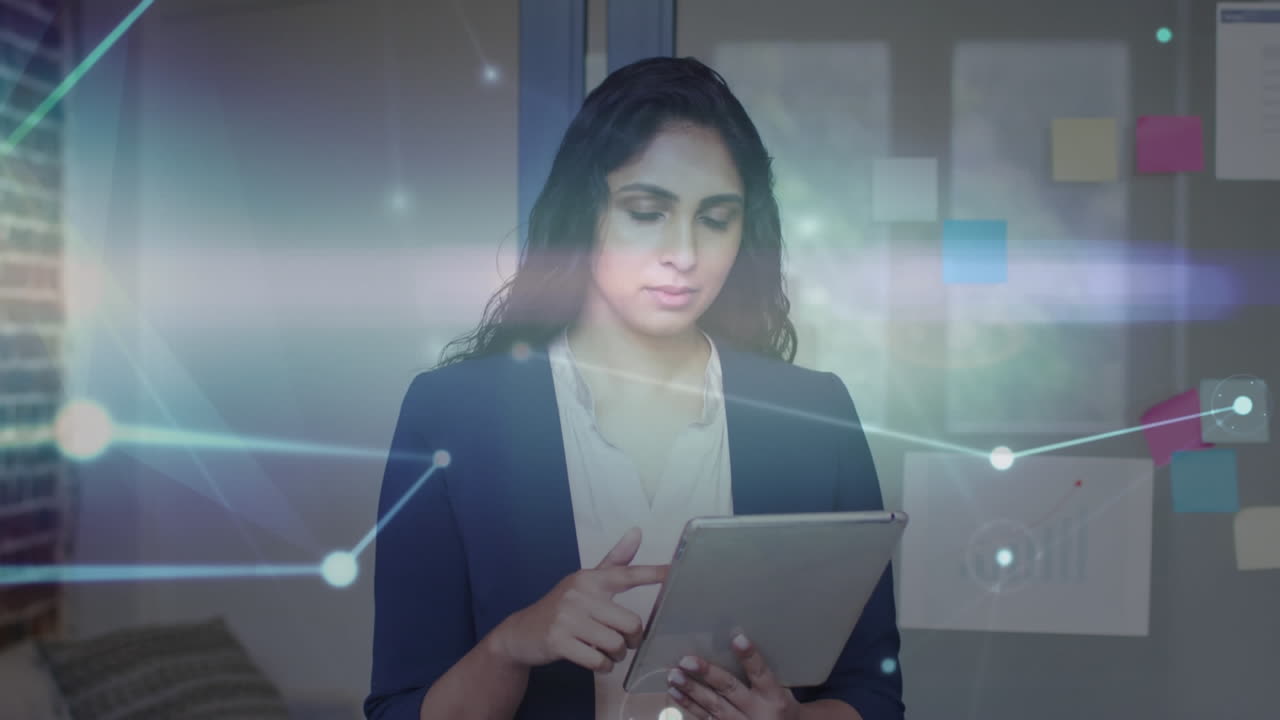 red de conexiones contra el retrato de una mujer india usando una tableta digital en la oficina