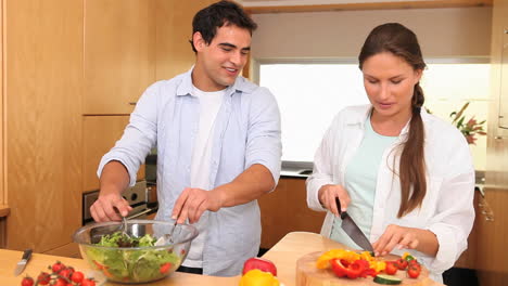 Couple-making-a-salad