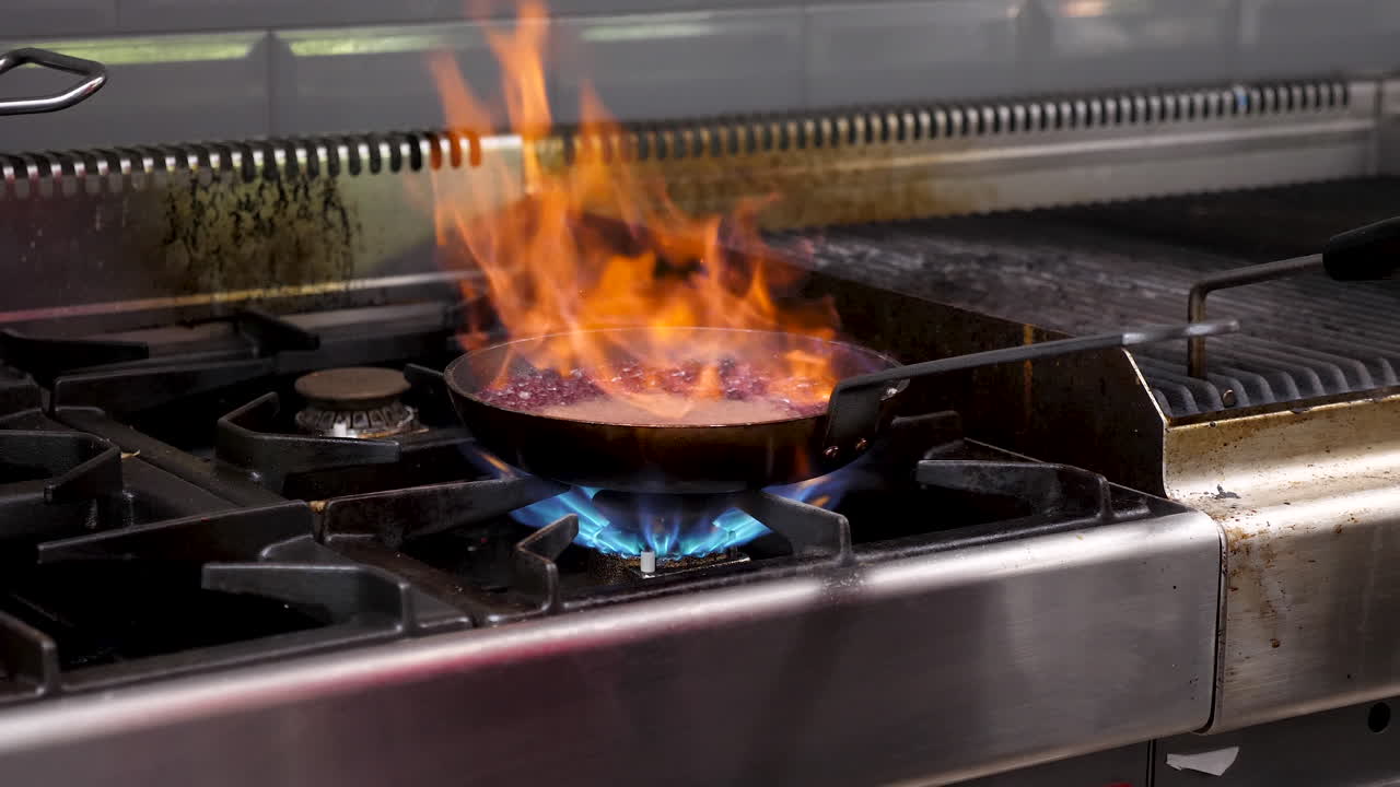 Flaming Dish in Professional Kitchen