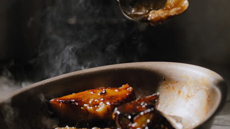 Sautéing-sweet-potatoes-in-a-sweet-brown-sauce-in-slow-motion