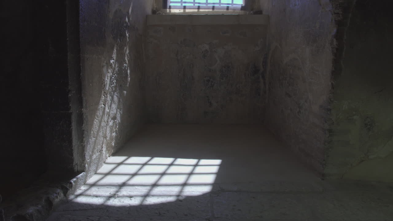 A window of a castle where the sunlight making a realistic view of the history.