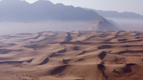 4k drone footage, aerial view of fossil rocks plateau in mleiha desert with sand ripples, geological landscape of the sphinx in sand dunes desert in the united arab emirates, drone videos