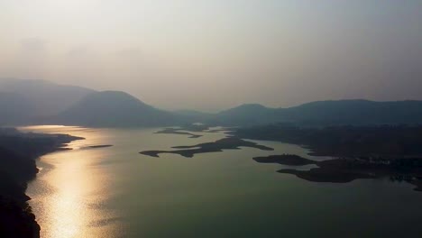 pristine-lake-at-the-edge-of-mountain-forests-aerial-shots-at-evening-video-is-taken-at-umiyam-lake-shillong-meghalaya-india