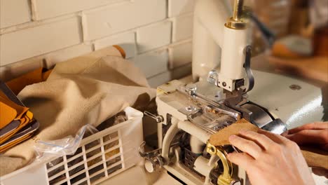 leatherworking process with vintage machine