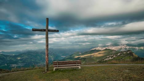 timelapse in the front of a cross at the mountain ebenalp in switzerland