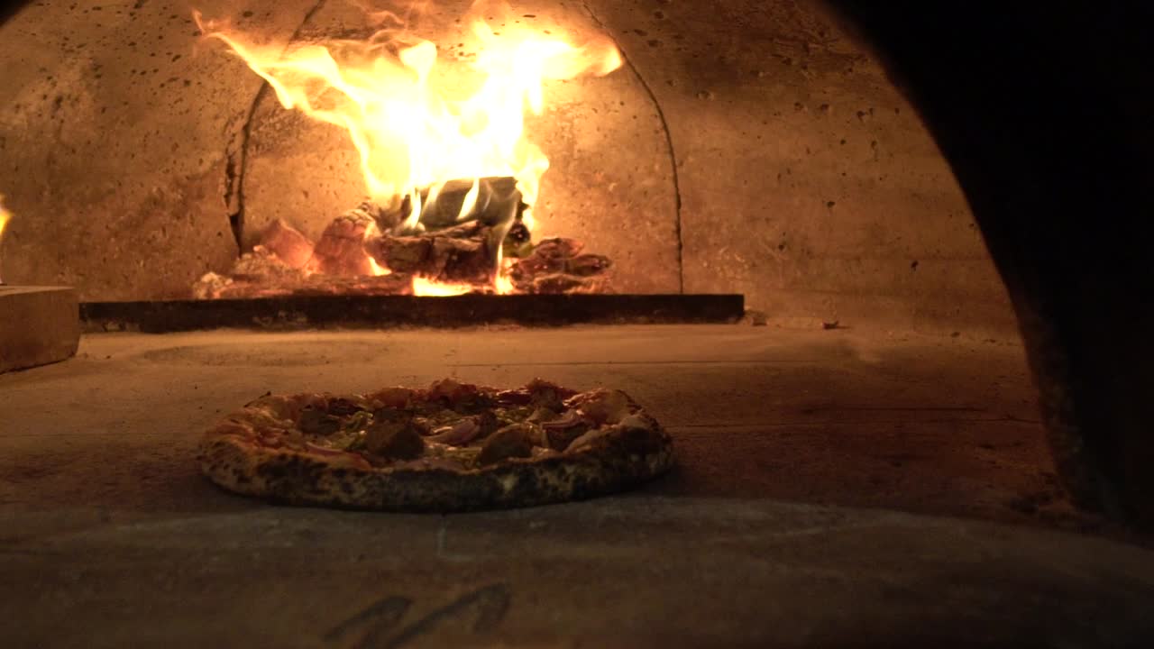 Pizza In Brick Oven Slow Motion Fire