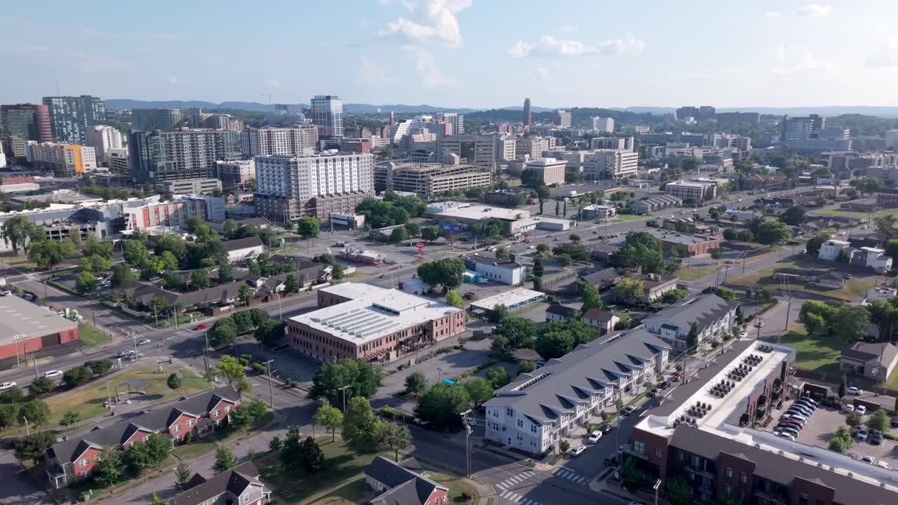 Aerial Flyover Of A Downtown Nashville Neighborhood With Suburban Homes And High-rise Apartments