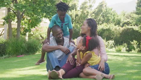 african american family spending time in the garden together