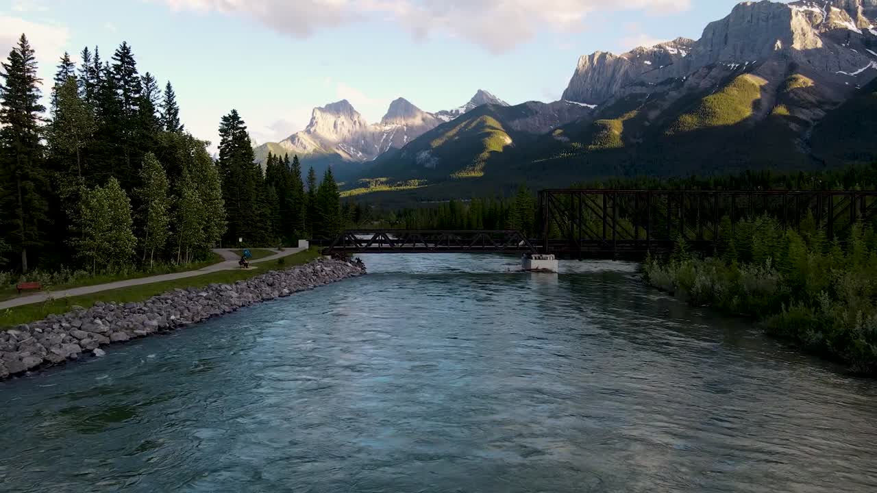 Following creek toward mountains summer