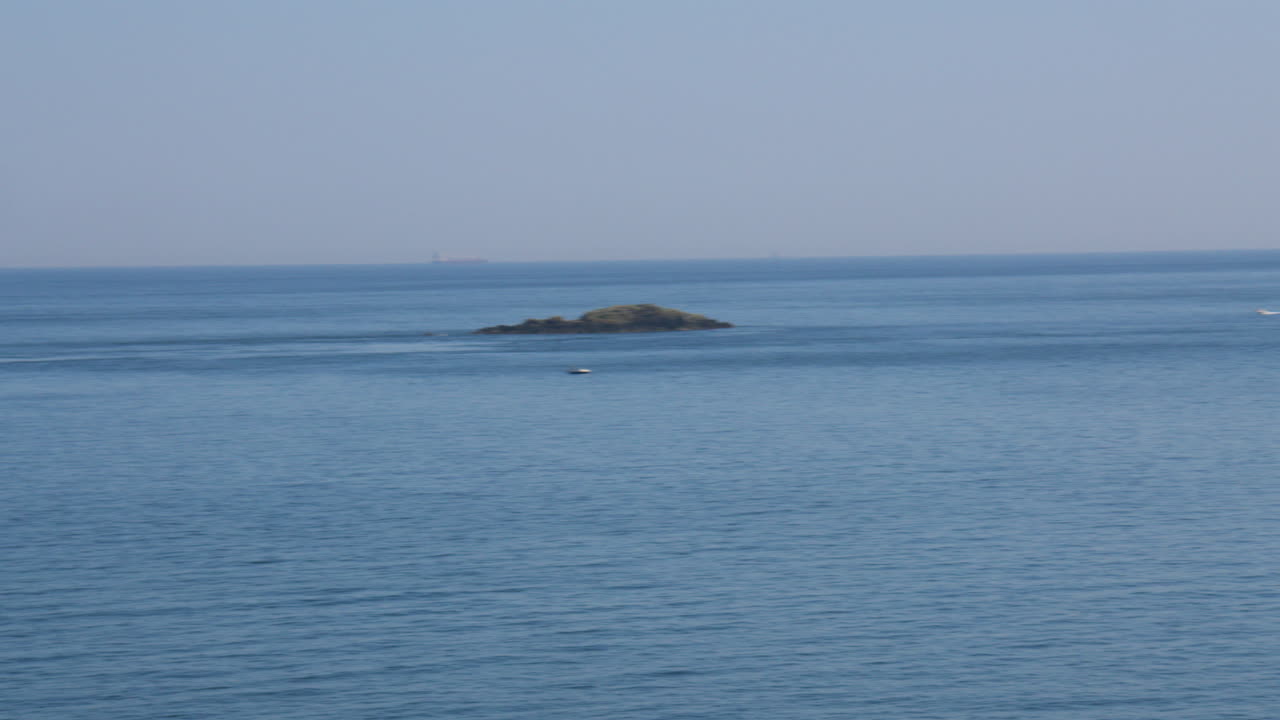 Panning shot of the east side of Porth Llechog, Bull Bay on the Isle of Anglesey