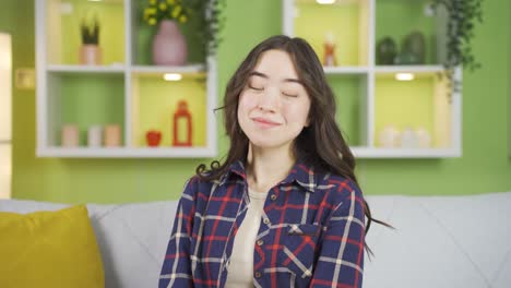 attractive young asian woman looking at camera.