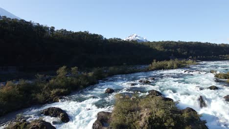 Water-Flowing-Down-The-Rocky-River-To-The-Petrohue-Waterfall-In-Chile