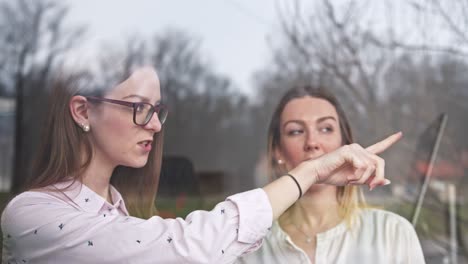 two teenagers enjoy the view outside, quarantine