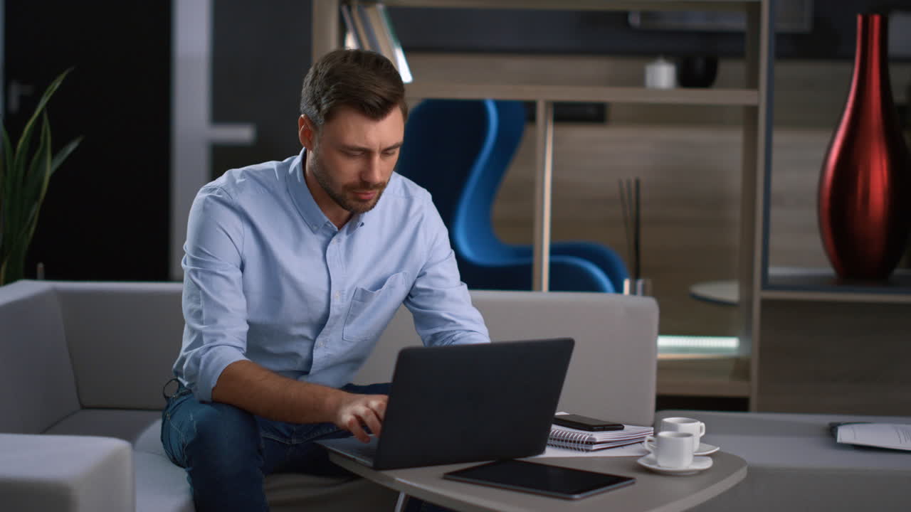 Professional ceo working laptop computer device browsing social media in office.
