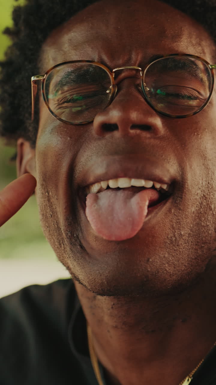 Close-up of Young African American Man Making Playful Faces